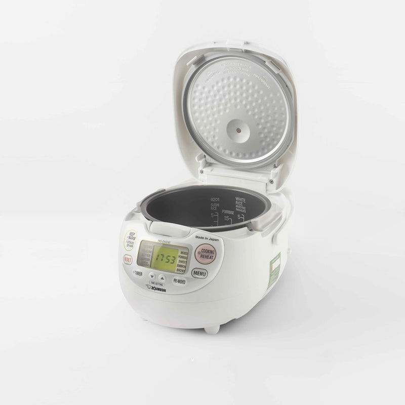 Zojirushi Neuro Fuzzy Rice Cooker NS-ZAQ10 with lid open, revealing inner pot and steam cap.

