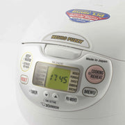 Close-up of the control panel and sticker label on the Zojirushi Neuro Fuzzy Rice Cooker NS-ZAQ10.

