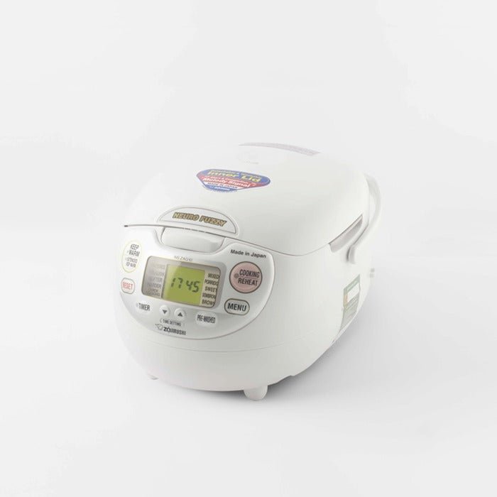 The Zojirushi Neuro Fuzzy 5.5-cup rice cooker, showing its classic white egg-shaped design and detailed digital control panel with multiple menu settings.

