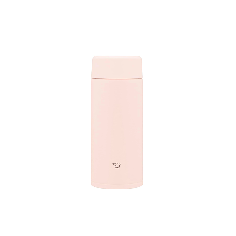 A studio photo of the baby pink Zojirushi TUFF SU-AA36 vacuum insulated flask, shown from the front highlighting its minimalist design and seamless screw-top lid.