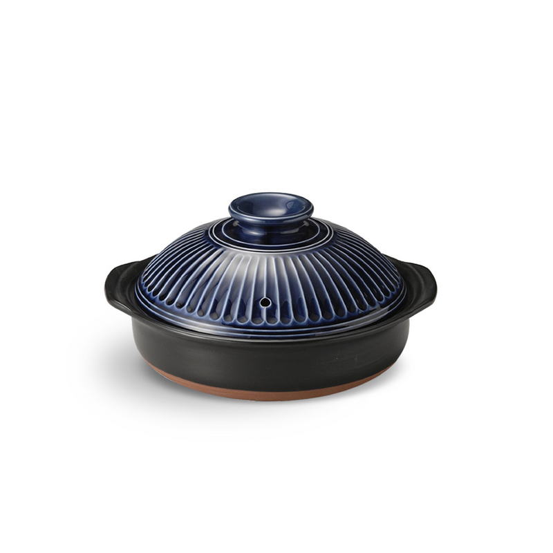 A product image of the Size 7 Ginpo Kikka donabe, showing its black clay base and the glossy, patterned dark blue single lid.

