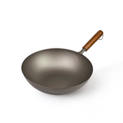 A product image of the Hasemoto 30cm Pure Titanium Wok, showcasing its lightweight design, matte grey finish, and natural wood handle.

