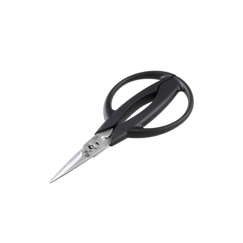 The compact Kai Seki Magoroku kitchen scissors (DH3312), featuring a unique rounded handle design for precision work, shown on a plain white background.
