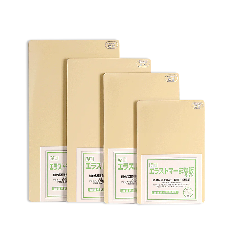 Four Yoshikawa antibacterial polyethylene cutting boards in a range of sizes, all in a light beige colour, displayed together on a white background.
