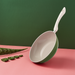 Happycall Agave Ceramic Nonstick Induction Wok & Frypan Set - 28cm: on a green backdrop