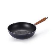 The 28cm Happycall Crocodile Graphene nonstick induction wok, showing its deep sides, hexagonal patterned interior, and wood-style handle, angled on a white background.
