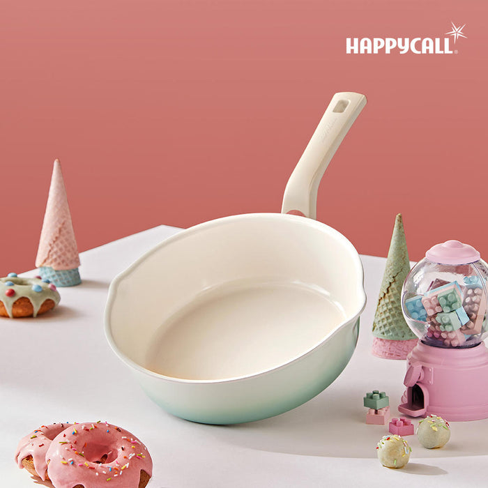 Happycall IH Flex 3 in 1 Saucepan - 22cm Spread Mint: standing angle in a pink background setting