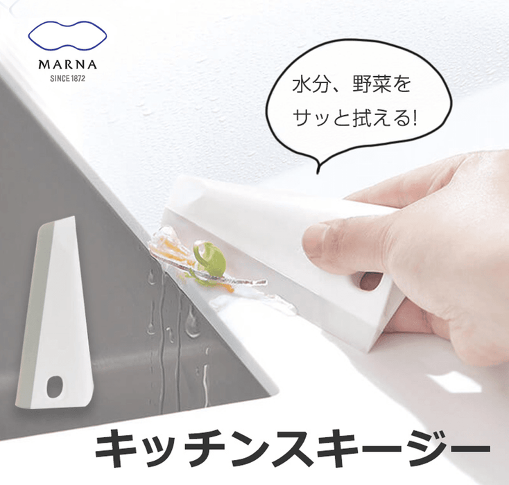 Marna Kitchen Squeegee: cleaning cooktop