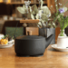 Miyaco Classic Stainless Steel Kettle 1.5L Black - Made in Japan. Sitting on a table.