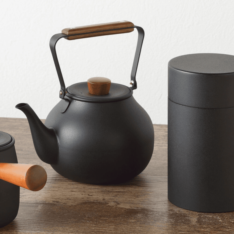 Miyaco Classic Stainless Steel Teapot 700ml Black - Made in Japan. On A Table.