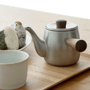 Miyaco Classic Stainless Steel Teapot 380ml - Made in Japan On A Table.
