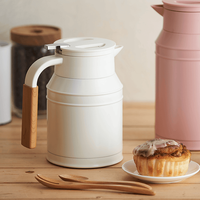 Mosh Stainless Steel Vacuum Insulated Carafe 1L Ivory: with cake.