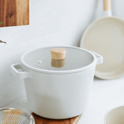 Neoflam Fika Ceramic Nonstick Induction Stock Pot - 22cm 4.6L: On a table