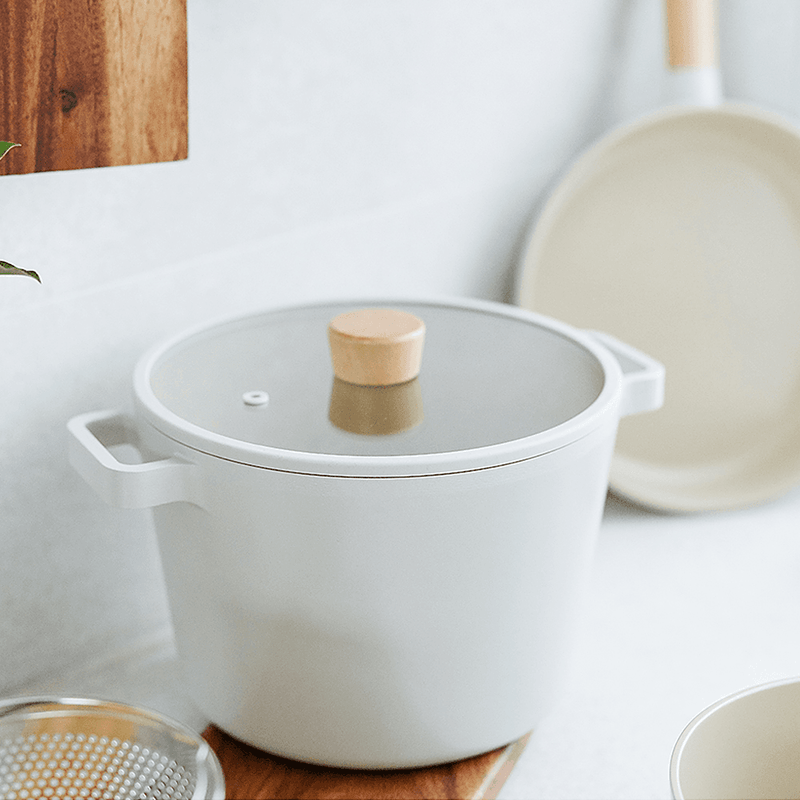 Neoflam Fika Ceramic Nonstick Induction Stock Pot - 22cm 4.6L: On a table