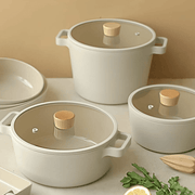 Neoflam Fika Ceramic Nonstick Induction Stock Pot with Lid - 26cm (6L) - On a table