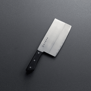 The Nosyu Magoroku Stainless Steel Cleaver (180mm) with a black riveted handle, shown on a dark matte background.
