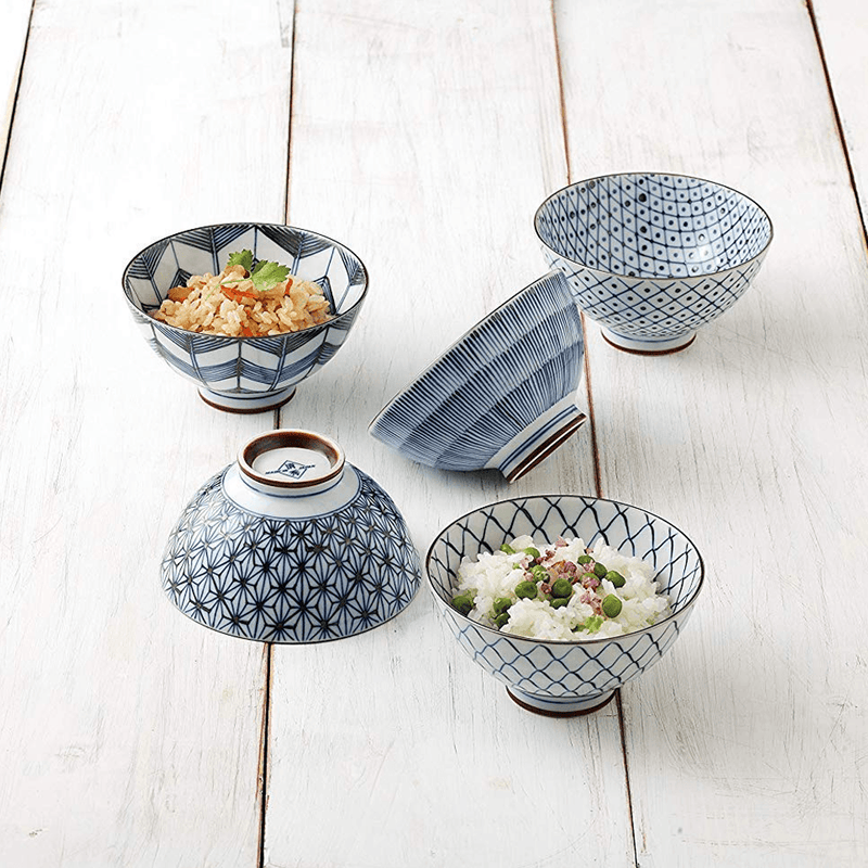 Saikai Hasami Yaki 5-Piece Classic Blue Japanese Bowl Set. On a table.