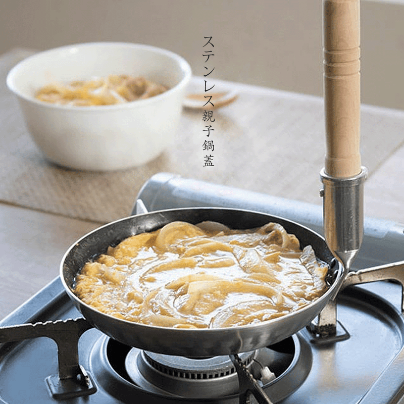 Display of a 16cm Oyakodon Induction Pan with Lid by Yoshikawa, perfect for classic dishes.
