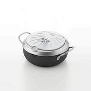 The Yoshikawa 20cm carbon steel deep fryer shown with its multi-functional lid fully closed for storage.
