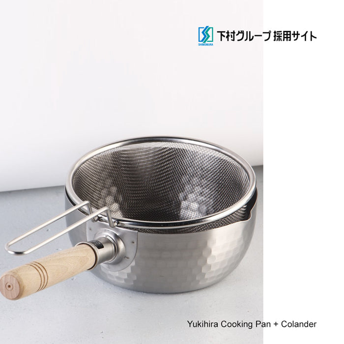 Yoshikawa Yukihira Saucepan 20cm with Strainer - Made in Japan: On a table