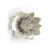 A photo of the Aito Seto Yaki Amaryllis Glazed Dinner Plate in glossy grey, showing its flower-like shape and crackled glaze finish.