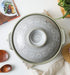 Ginpo Hana Mishima Donabe Japanese Clay Pot 25cm (Size 8) - Made in Japan. On dining table.
