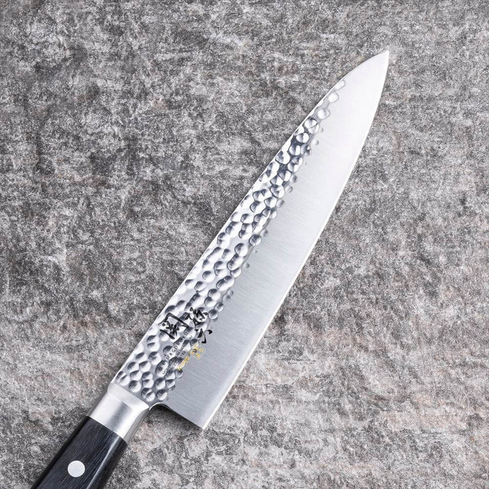 Kai Seki Magoroku Hammered Chef Knife 180mm: stainless steel blade