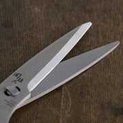 A detailed close-up of the sharp, precisely ground stainless steel blades of the Kai Seki Magoroku kitchen scissors.
