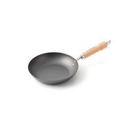 A product image of the River Light Kiwame 24cm Carbon Steel Frypan, showing its classic shape and branded natural wood handle.