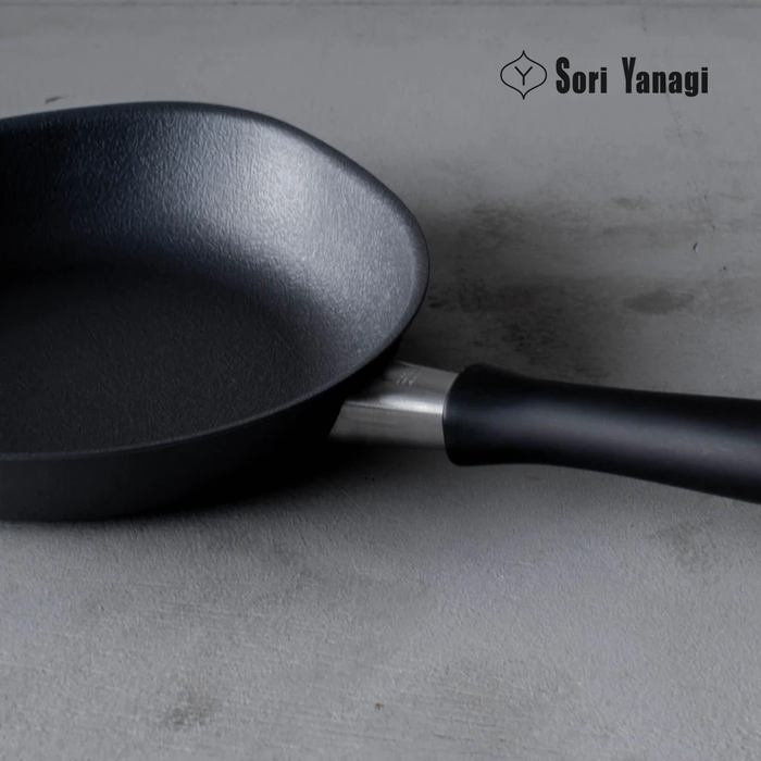 Sori Yanagi Pure Iron Induction Frypan 25cm with Stainless Steel Lid: On a stone table.