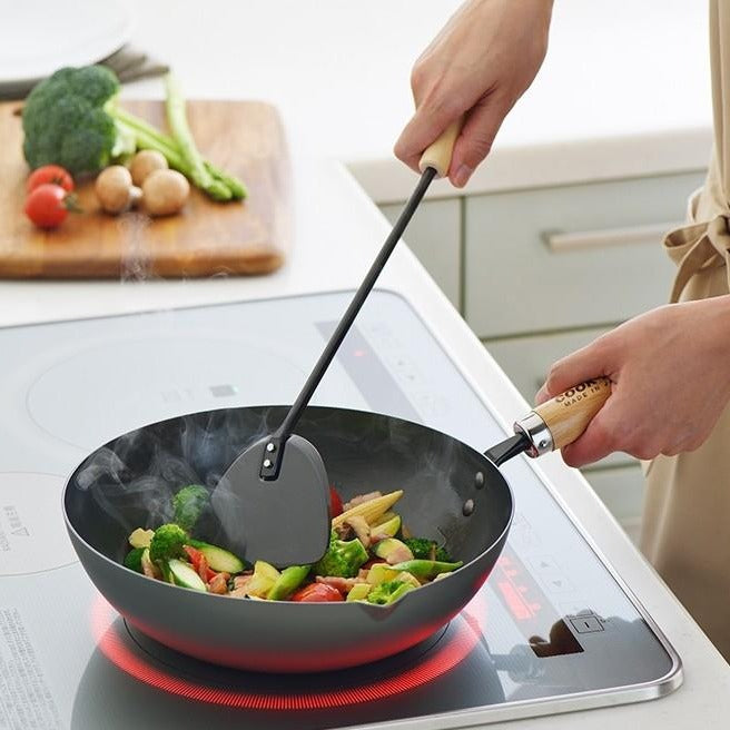 Yoshikawa COOK-PAL REN 28cm Premium Carbon Steel Wok. Cooking on induction cooktop.