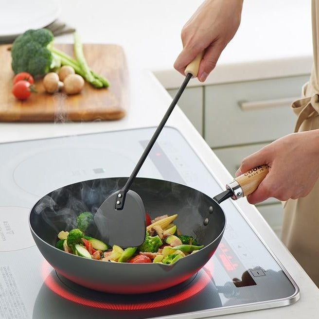Yoshikawa COOK-PAL REN 36cm Premium Carbon Steel Wok with Two Handles. Cooking on induction cooktop.