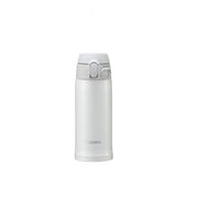 A studio photo of the Zojirushi SM-TA36 TUFF vacuum insulated flask in white, shown from the front highlighting its one-touch release lid and locking switch.