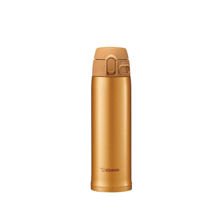 A studio photo of the Zojirushi SM-TA48 TUFF vacuum insulated flask in gold, shown from the front highlighting its one-touch release lid and locking switch.
